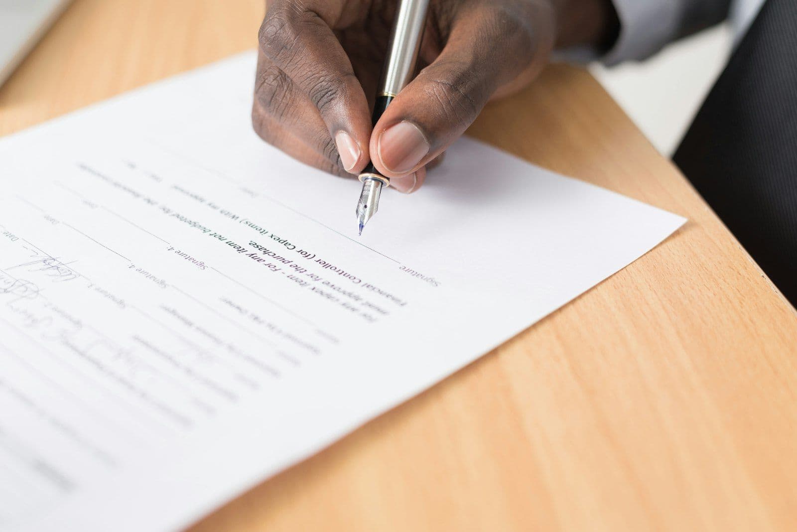 Signing the terms of a settlement agreement